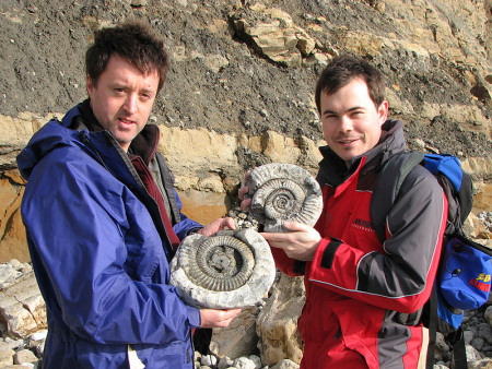 Andrew Holmes and Roy Shepherd with fossil ammonites