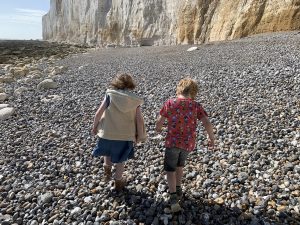 Fossil hunting among the pebbles at Seaford Head
